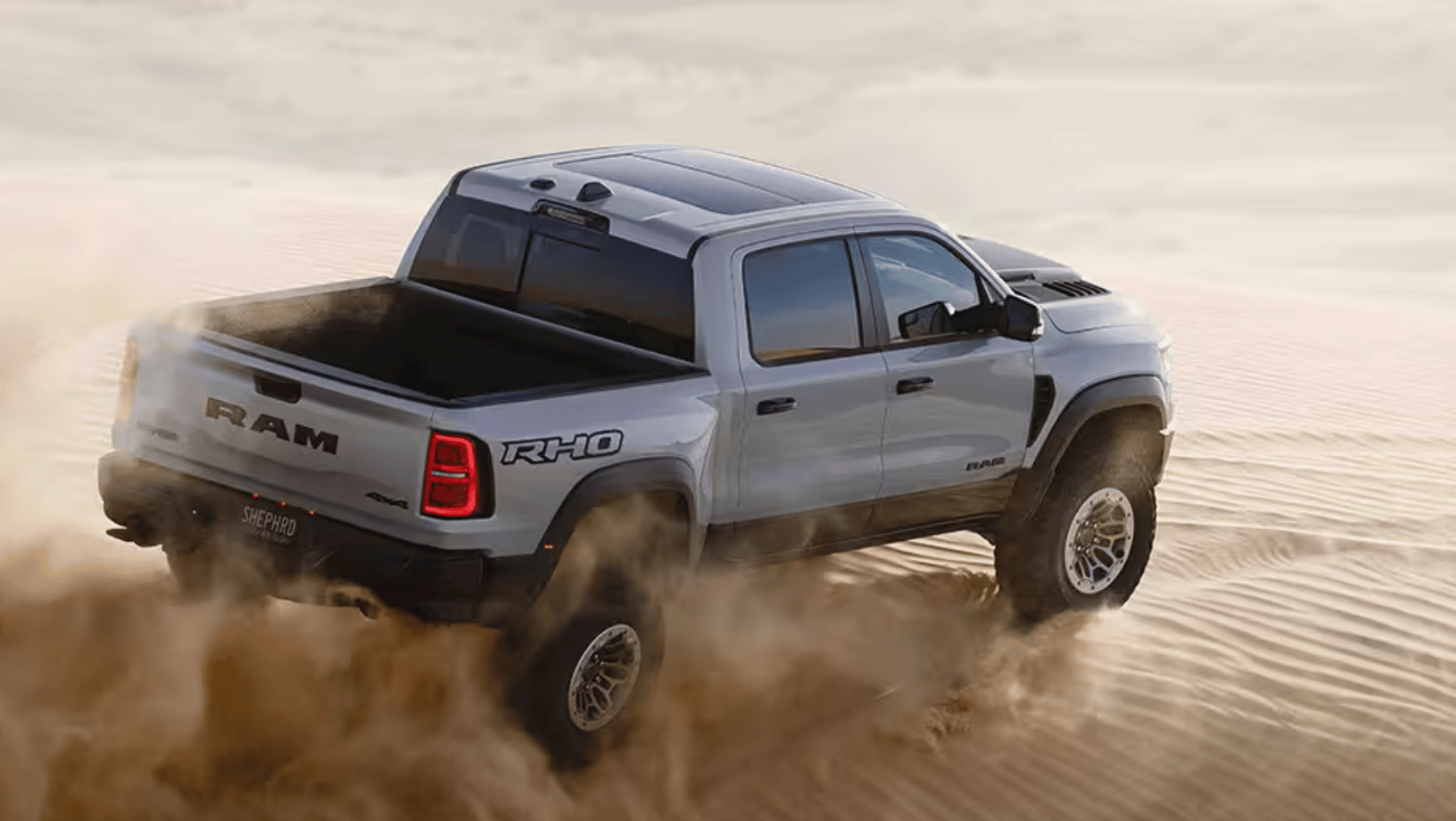 Back view of 2026 Ram 1500 RHO in Hot Springs, AR